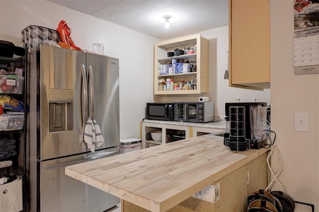 11129 E Thayer St, Midwest City, OK 73130 - kitchen featuring stainless steel fridge with ice dispenser and wood counters