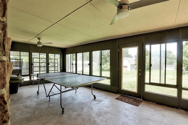 11129 E Thayer St, Midwest City, OK 73130 - recreation room with a ceiling fan and concrete flooring