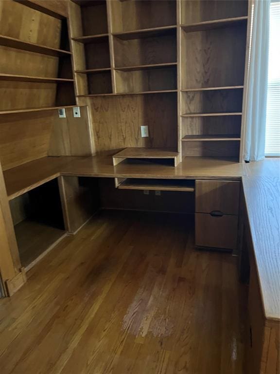 802 N Hudson St, Altus, OK 73521 - unfurnished office featuring dark wood-style floors and built in desk