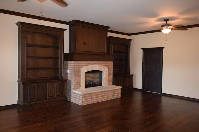 1713 Rain Tree Ln, Midwest City, OK 73130 - unfurnished living room with ceiling fan, baseboards, dark wood-style floors, ornamental molding, and a brick fireplace