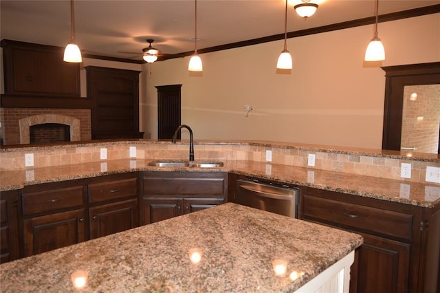 1713 Rain Tree Ln, Midwest City, OK 73130 - kitchen featuring stainless steel dishwasher, ceiling fan, a sink, dark brown cabinetry, and crown molding