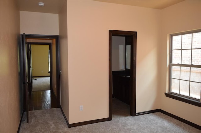 1713 Rain Tree Ln, Midwest City, OK 73130 - unfurnished bedroom with carpet flooring and baseboards