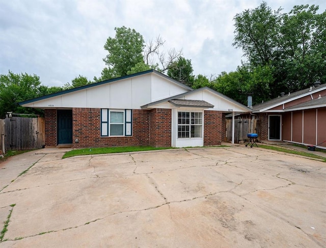 6225 SE 46th St, Oklahoma City, OK 73135 - view of front of property with brick siding and board and batten siding