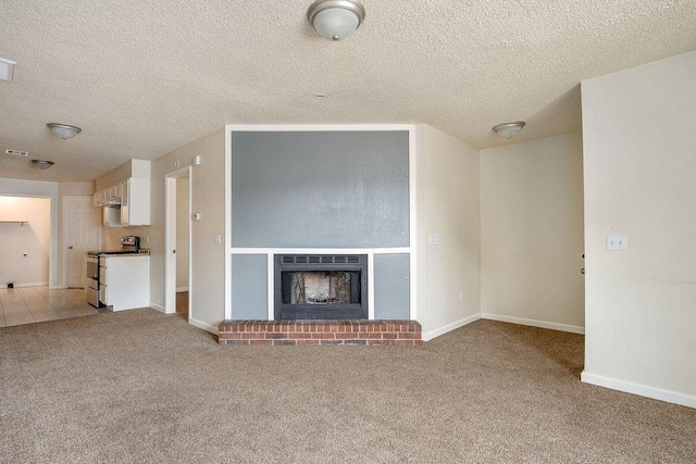 6225 SE 46th St, Oklahoma City, OK 73135 - unfurnished living room featuring light carpet, a textured ceiling, and a fireplace