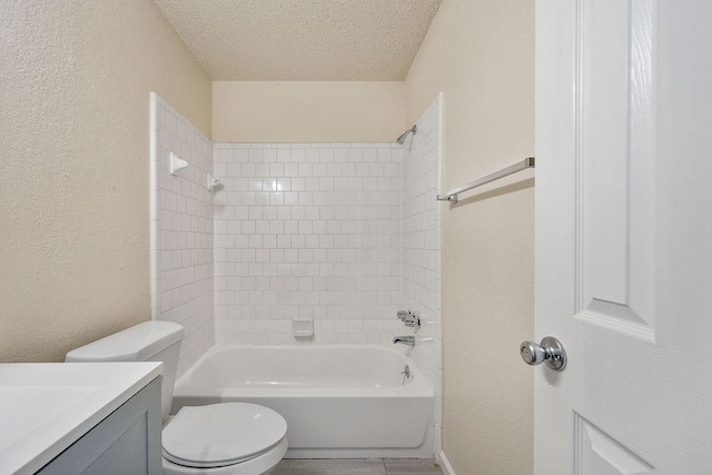 6225 SE 46th St, Oklahoma City, OK 73135 - full bathroom featuring vanity, washtub / shower combination, a textured ceiling, and a textured wall
