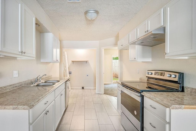6225 SE 46th St, Oklahoma City, OK 73135 - kitchen featuring appliances with stainless steel finishes, under cabinet range hood, white cabinets, light countertops, and a textured ceiling