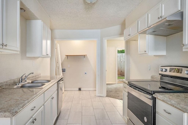 6225 SE 46th St, Oklahoma City, OK 73135 - kitchen featuring appliances with stainless steel finishes, under cabinet range hood, white cabinetry, and a textured ceiling