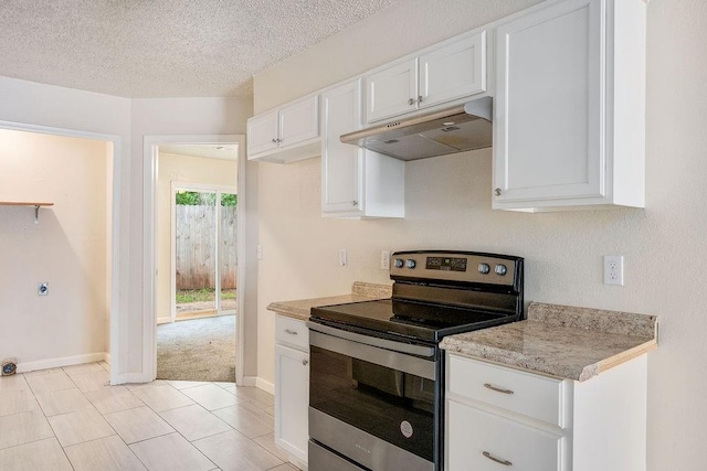 6225 SE 46th St, Oklahoma City, OK 73135 - kitchen with electric range, under cabinet range hood, white cabinetry, light countertops, and a textured ceiling