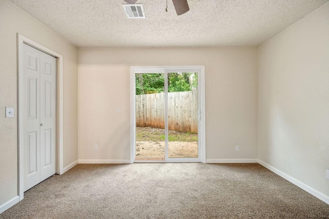 6225 SE 46th St, Oklahoma City, OK 73135 - carpeted spare room featuring a ceiling fan and a textured ceiling