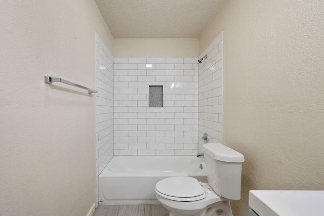 6225 SE 46th St, Oklahoma City, OK 73135 - full bath with a textured ceiling,  shower combination, a textured wall, and vanity