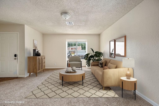 6225 SE 46th St, Oklahoma City, OK 73135 - living area featuring light colored carpet, a textured ceiling, and a textured wall