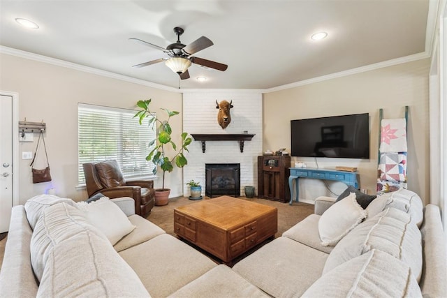 2303 Whispering Pine Blvd, Shawnee, OK 74804 - living room featuring crown molding, ceiling fan, a fireplace, and recessed lighting
