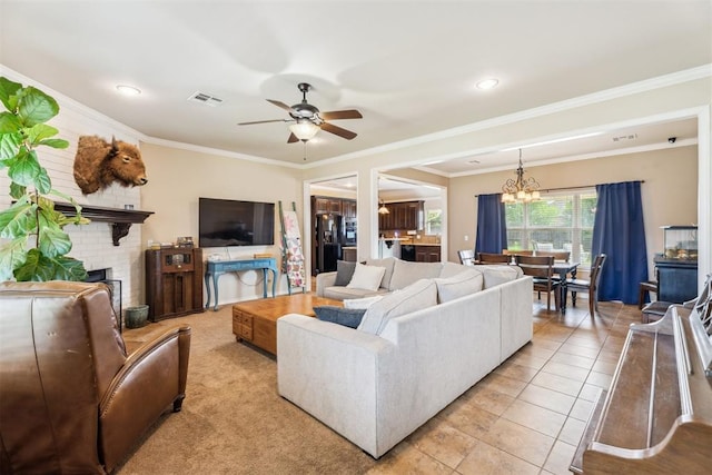 2303 Whispering Pine Blvd, Shawnee, OK 74804 - living room featuring a chandelier, ceiling fan, crown molding, a brick fireplace, and light tile patterned floors