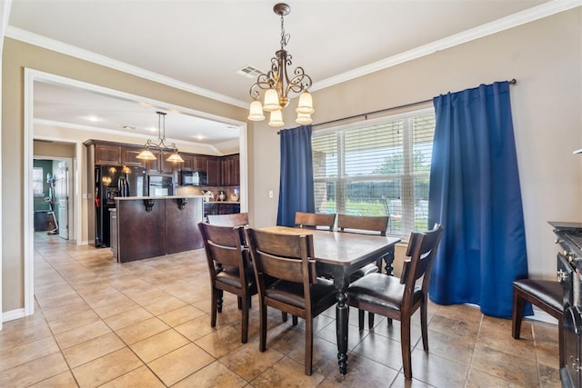 2303 Whispering Pine Blvd, Shawnee, OK 74804 - dining area featuring ornamental molding, a chandelier, and light tile patterned floors