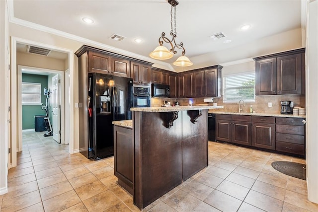 2303 Whispering Pine Blvd, Shawnee, OK 74804 - kitchen featuring black appliances, dark brown cabinets, light tile patterned floors, tasteful backsplash, and crown molding