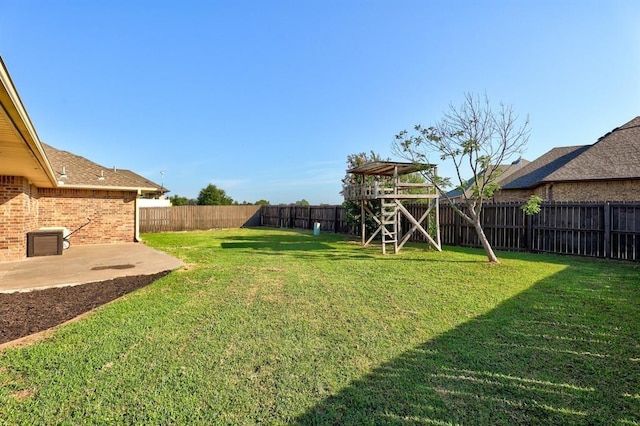 2303 Whispering Pine Blvd, Shawnee, OK 74804 - fenced backyard with a patio area