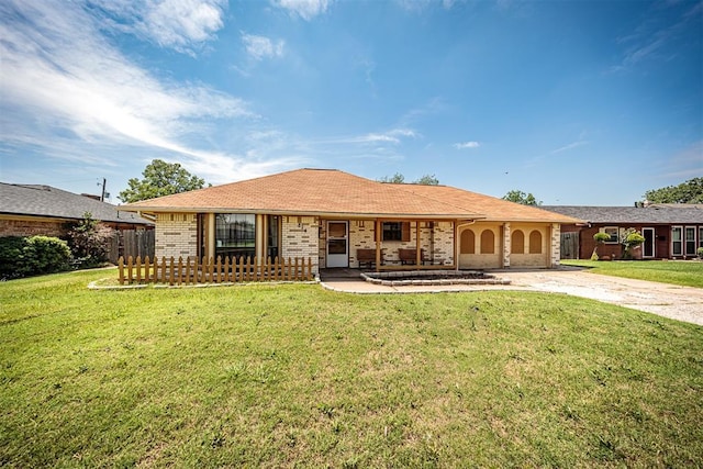 814 NW 48th St, Lawton, OK 73505 - view of front facade with a porch, brick siding, and concrete driveway