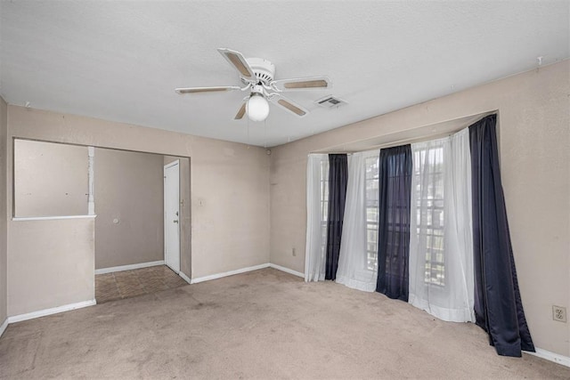 814 NW 48th St, Lawton, OK 73505 - unfurnished bedroom with carpet flooring, baseboards, and a ceiling fan