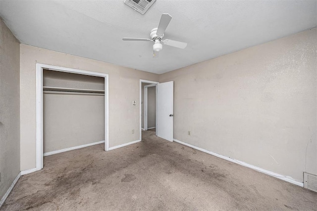 814 NW 48th St, Lawton, OK 73505 - unfurnished bedroom featuring carpet flooring, a closet, baseboards, and a ceiling fan