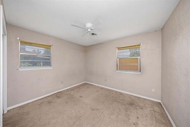 814 NW 48th St, Lawton, OK 73505 - unfurnished room featuring a ceiling fan, carpet flooring, and baseboards