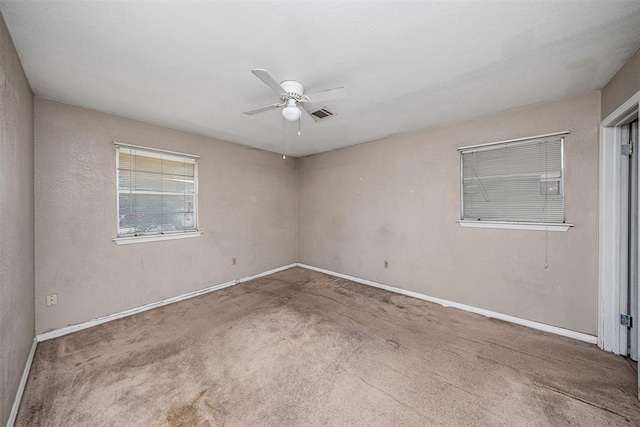 814 NW 48th St, Lawton, OK 73505 - carpeted spare room with ceiling fan and baseboards