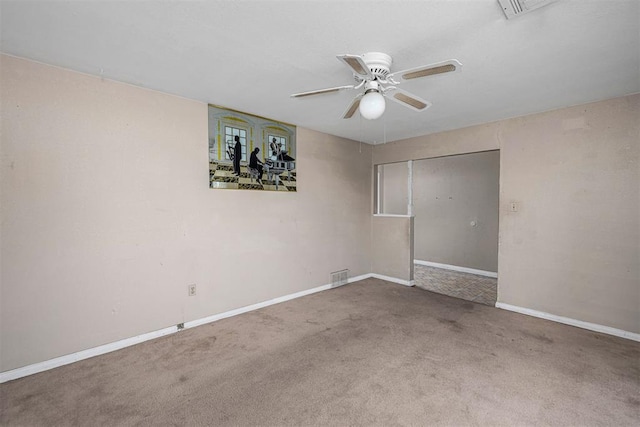 814 NW 48th St, Lawton, OK 73505 - unfurnished room with a ceiling fan, carpet flooring, and baseboards