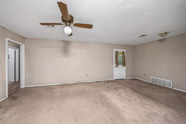 814 NW 48th St, Lawton, OK 73505 - empty room with carpet floors, a ceiling fan, and baseboards