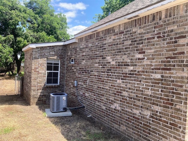 707 W Texas Ave, Anadarko, OK 73005 - exterior view of cooling unit and brick siding