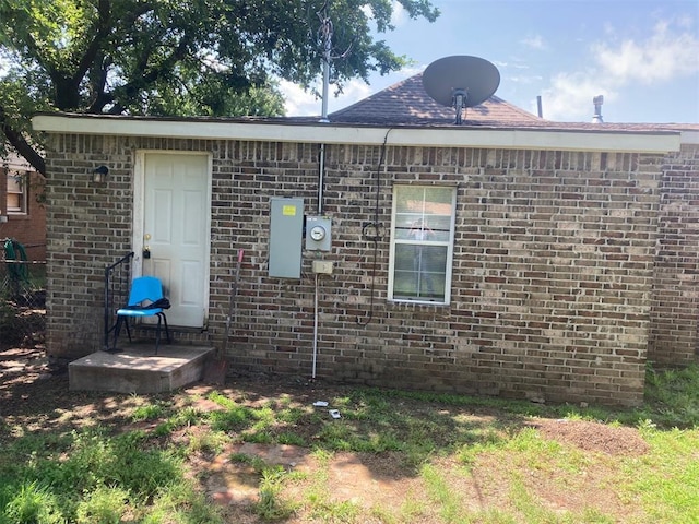 707 W Texas Ave, Anadarko, OK 73005 - view of side of property featuring brick siding