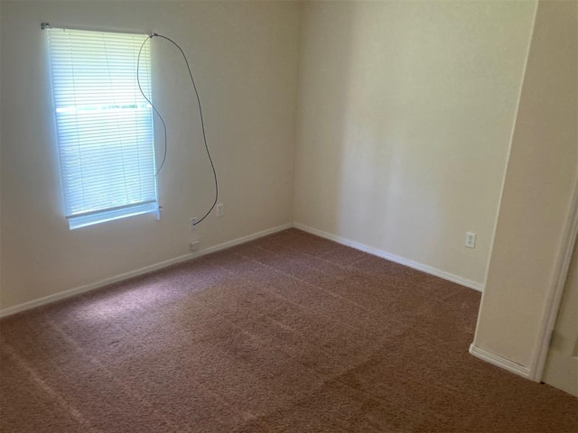 707 W Texas Ave, Anadarko, OK 73005 - unfurnished room with carpet flooring and baseboards