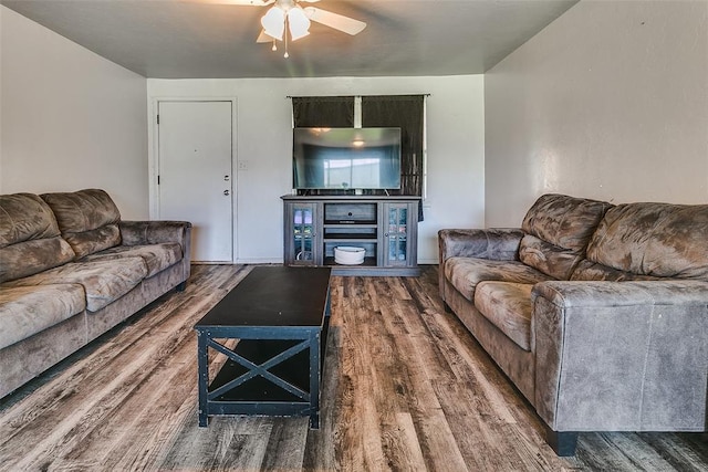 824 E Rose Dr, Midwest City, OK 73110 - living area featuring wood finished floors and a ceiling fan