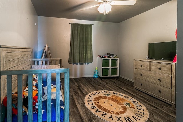824 E Rose Dr, Midwest City, OK 73110 - bedroom featuring dark wood-style flooring and a ceiling fan