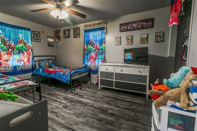 824 E Rose Dr, Midwest City, OK 73110 - bedroom featuring wood finished floors and ceiling fan
