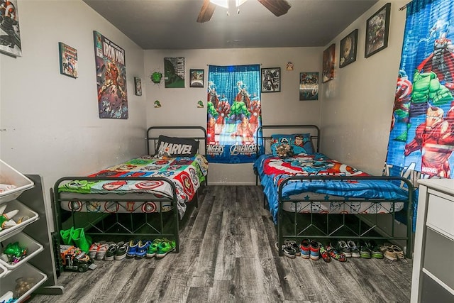 824 E Rose Dr, Midwest City, OK 73110 - bedroom with wood finished floors and ceiling fan