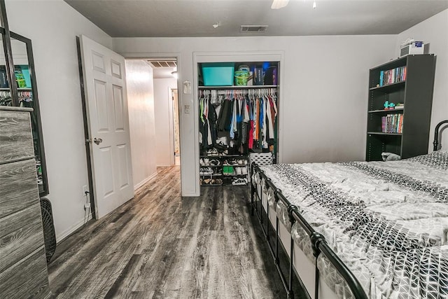 824 E Rose Dr, Midwest City, OK 73110 - bedroom featuring wood finished floors and a closet