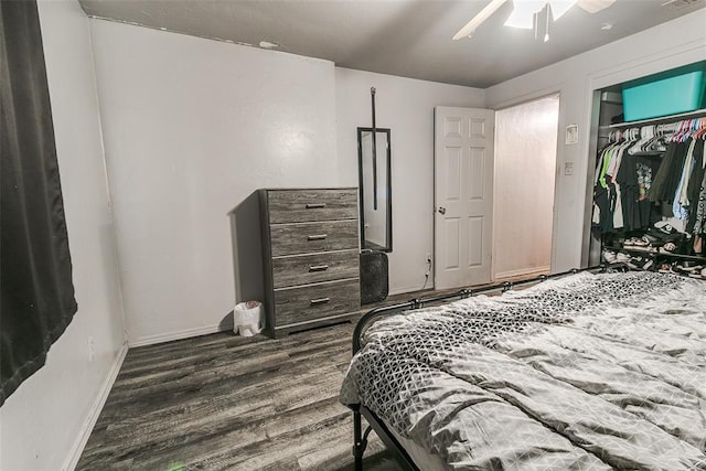 824 E Rose Dr, Midwest City, OK 73110 - bedroom with wood finished floors, a closet, and ceiling fan
