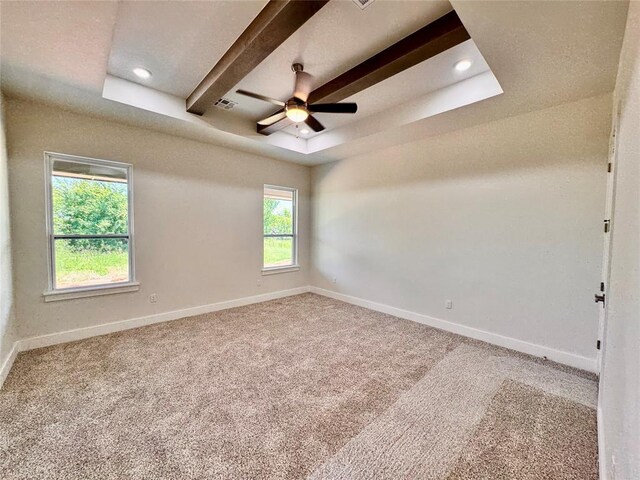 10165 NW 100th St, Yukon, OK 73099 - carpeted spare room with a raised ceiling, ceiling fan, and recessed lighting