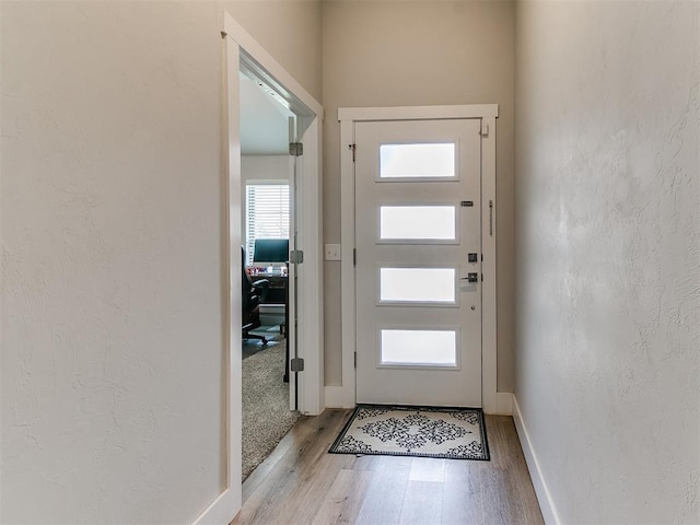 5512 Cheyenne Rd, Warr Acres, OK 73132 - foyer with wood finished floors and baseboards