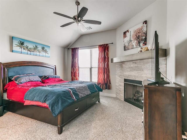5512 Cheyenne Rd, Warr Acres, OK 73132 - bedroom with vaulted ceiling, carpet floors, a fireplace, and ceiling fan