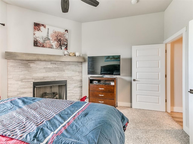 5512 Cheyenne Rd, Warr Acres, OK 73132 - bedroom with a fireplace, carpet floors, and a ceiling fan