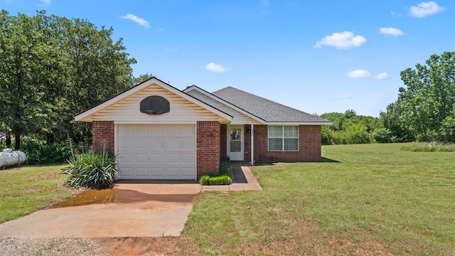 677 S Morgan Ave, Blanchard, OK 73010 - ranch-style house with brick siding, a front yard, concrete driveway, and an attached garage