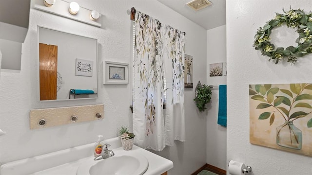 677 S Morgan Ave, Blanchard, OK 73010 - bathroom featuring vanity