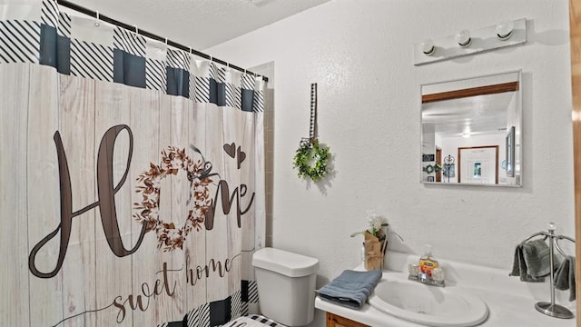 677 S Morgan Ave, Blanchard, OK 73010 - bathroom with vanity, a shower with shower curtain, and a textured wall