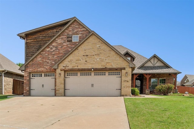 917 NW 186th St, Edmond, OK 73012 - english style home with concrete driveway, a garage, and brick siding