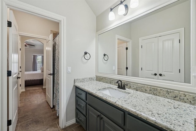 917 NW 186th St, Edmond, OK 73012 - bathroom with vanity and vaulted ceiling