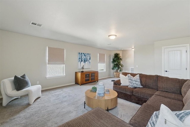917 NW 186th St, Edmond, OK 73012 - living room featuring light colored carpet and baseboards