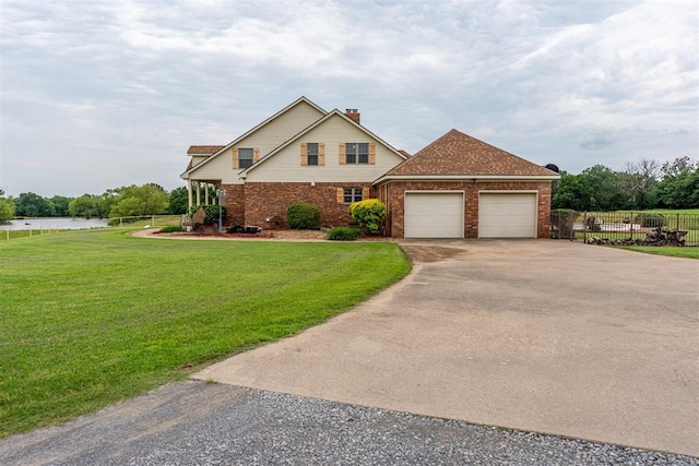 498 Big Horn Rd, Mcalester, OK 74501 - traditional-style house featuring gravel driveway, an attached garage, a chimney, and brick siding