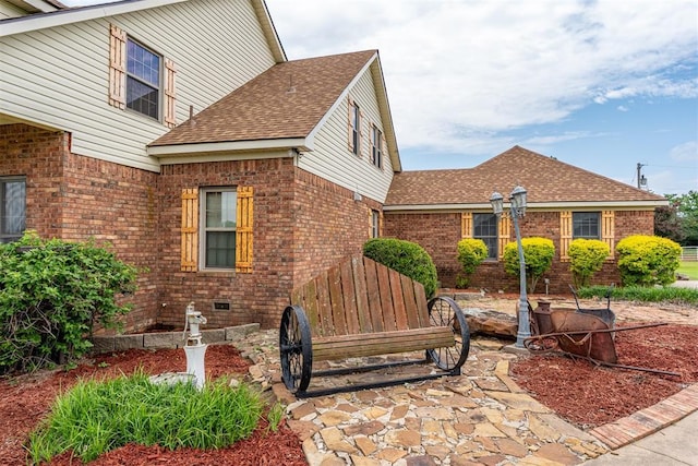 498 Big Horn Rd, Mcalester, OK 74501 - view of home's exterior with brick siding and a shingled roof