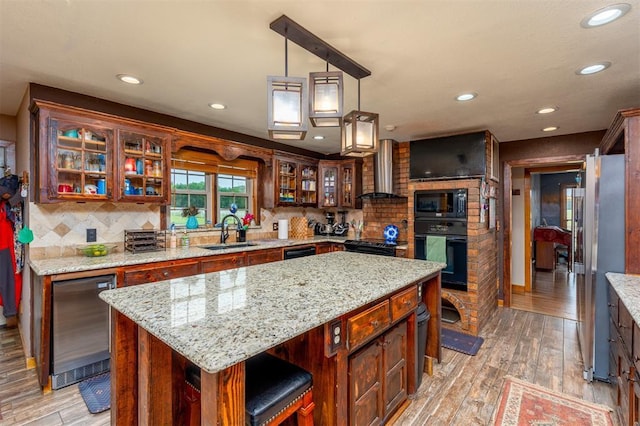 498 Big Horn Rd, Mcalester, OK 74501 - kitchen featuring black appliances, wall chimney range hood, wine cooler, recessed lighting, and a center island