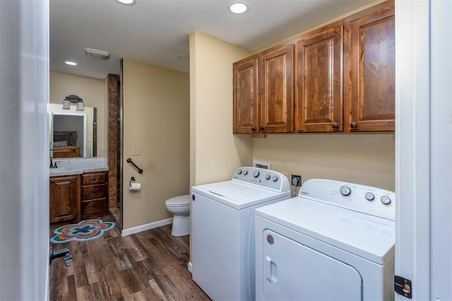 498 Big Horn Rd, Mcalester, OK 74501 - washroom with dark wood finished floors, separate washer and dryer, and recessed lighting